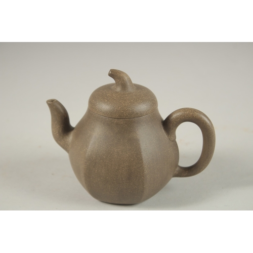 1293 - A CHINESE YIXING TEAPOT, with impressed mark to inner lid and base.