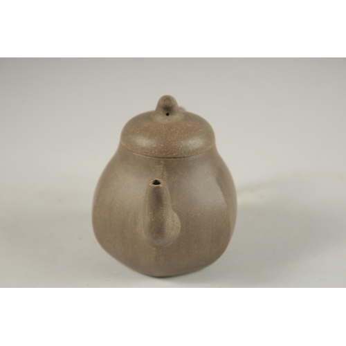 1293 - A CHINESE YIXING TEAPOT, with impressed mark to inner lid and base.