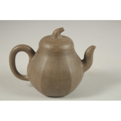 1293 - A CHINESE YIXING TEAPOT, with impressed mark to inner lid and base.