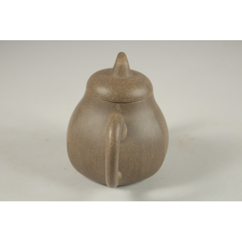 1293 - A CHINESE YIXING TEAPOT, with impressed mark to inner lid and base.