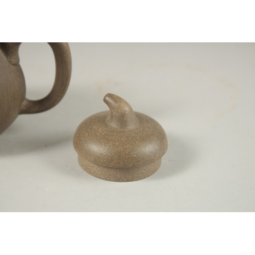 1293 - A CHINESE YIXING TEAPOT, with impressed mark to inner lid and base.