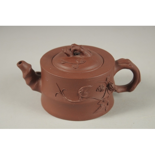 1295 - A CHINESE YIXING TEAPOT, with impressed mark to inner lid and base, (lid repair).