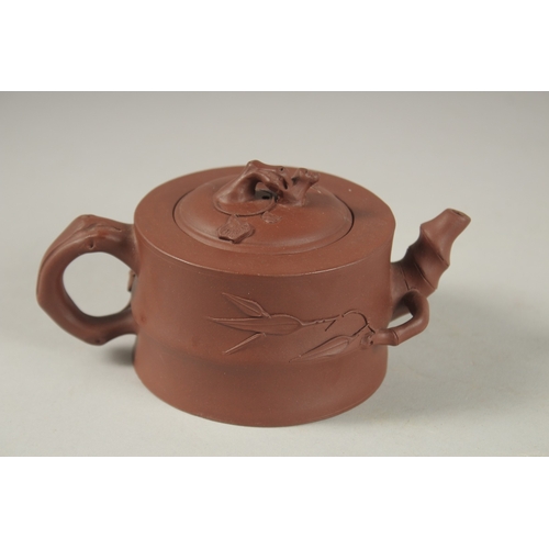 1295 - A CHINESE YIXING TEAPOT, with impressed mark to inner lid and base, (lid repair).