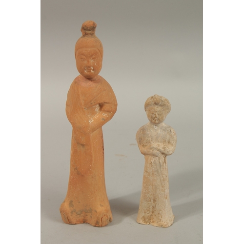 1042 - TWO CHINESE POTTERY FIGURES, 26.5cm and 18cm high.