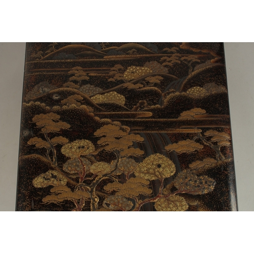 1061 - A VERY FINE JAPANESE MEIJI PERIOD GILT AND BLACK LACQUER BOX, beautifully decorated with landscape s... 