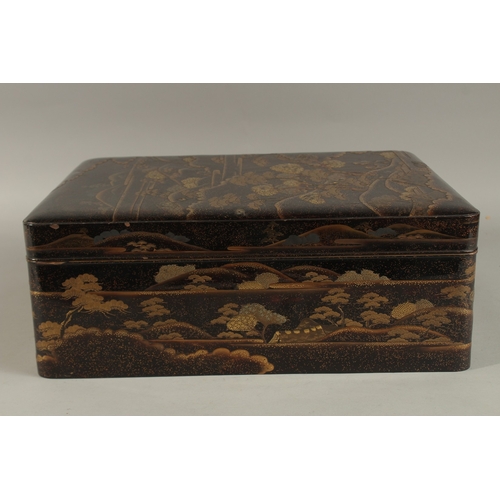 1061 - A VERY FINE JAPANESE MEIJI PERIOD GILT AND BLACK LACQUER BOX, beautifully decorated with landscape s... 