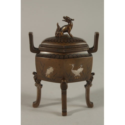 1068 - A FINE JAPANESE MEIJI PERIOD NOGAWA BRONZE KORO AND COVER, with fine inlays depicting cranes, 11cm.