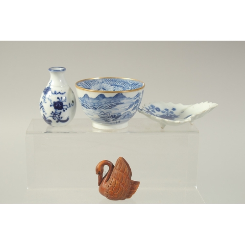 1073 - THREE PIECES OF CHINESE BLUE AND WHITE PORCELAIN, comprising tea bowl, a small leaf-from dish, and a... 