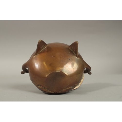 1214 - A CHINESE BRASS TWIN HANDLE CENSER AND COVER, 11cm high.