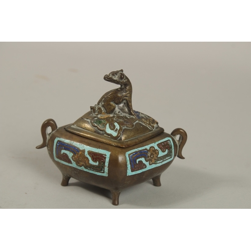 1215 - A CHINESE ENAMELLED BRASS TWIN HANDLE CENSER AND COVER, with zoomorphic finial and raised on four fe... 