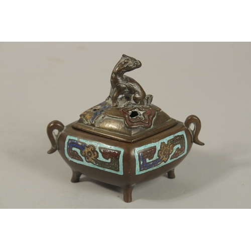 1215 - A CHINESE ENAMELLED BRASS TWIN HANDLE CENSER AND COVER, with zoomorphic finial and raised on four fe... 