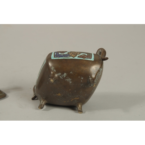 1215 - A CHINESE ENAMELLED BRASS TWIN HANDLE CENSER AND COVER, with zoomorphic finial and raised on four fe... 