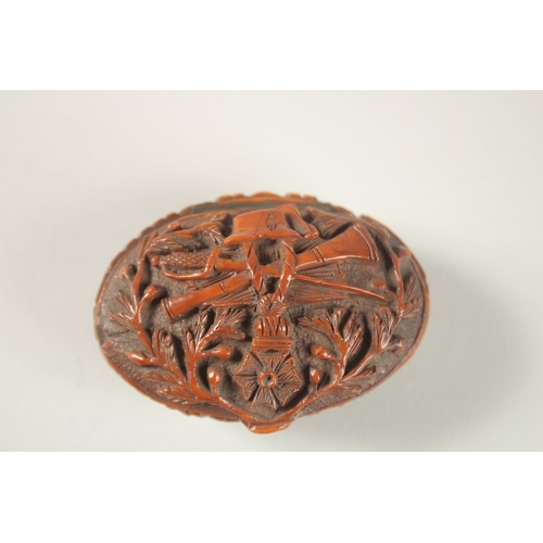 1269 - A CHINESE EXPORT CARVED NUT BOX, with European decoration.