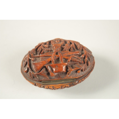 1269 - A CHINESE EXPORT CARVED NUT BOX, with European decoration.