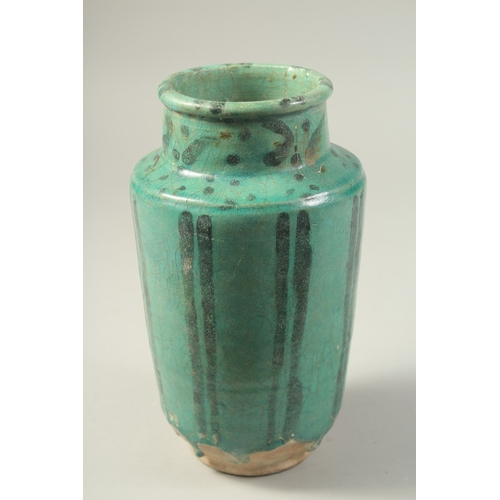 1280 - A PERSIAN KASHAN TURQUOISE GLAZED POTTERY VASE, 24cm high.