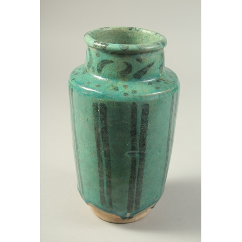 1280 - A PERSIAN KASHAN TURQUOISE GLAZED POTTERY VASE, 24cm high.