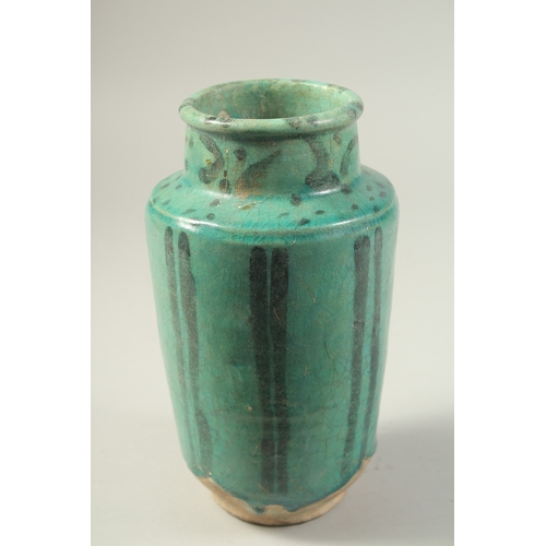 1280 - A PERSIAN KASHAN TURQUOISE GLAZED POTTERY VASE, 24cm high.