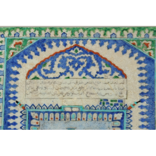 1282 - AN ISLAMIC GLAZED POTTERY TILE DEPICTING MECCA, 33cm x 27cm.