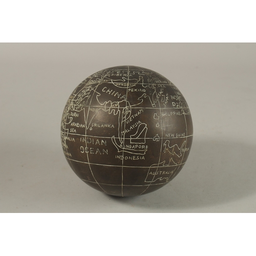 1283 - AN ENGRAVED BRASS GLOBE.