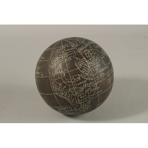 1283 - AN ENGRAVED BRASS GLOBE.