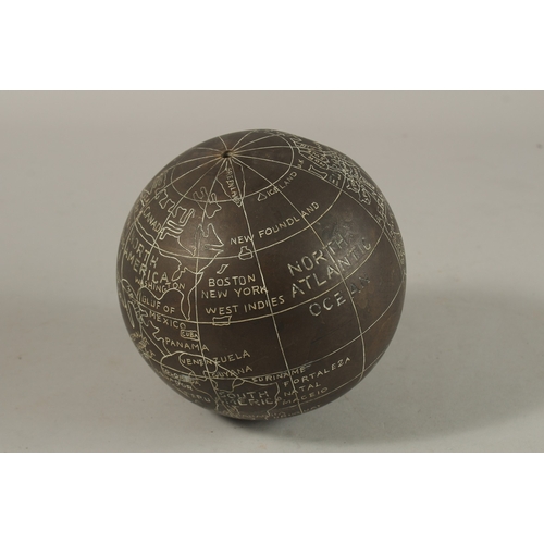 1283 - AN ENGRAVED BRASS GLOBE.