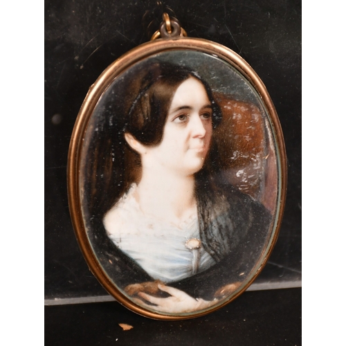 165 - English School, Early 19th Century, a miniature portrait of a lady, watercolour on ivory, 2.75