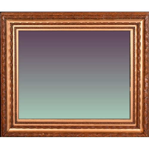 28 - A 19th Century parcel-gilt and carved oak frame, rebate size 30