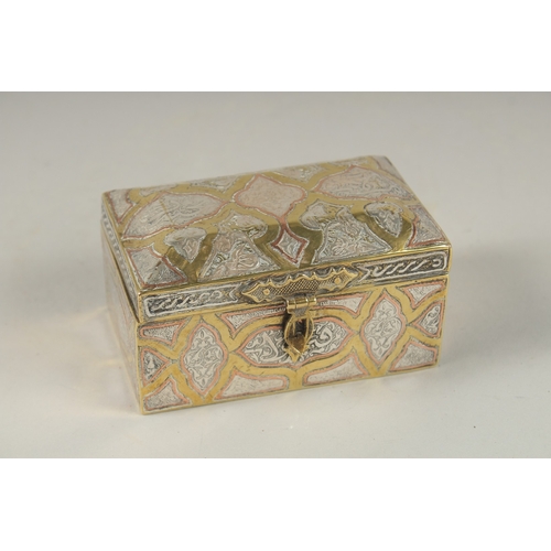 106 - A FINE 19TH CENTURY DAMASCUS SILVER AND COPPER INLAID BRASS BOX, 10cm across.