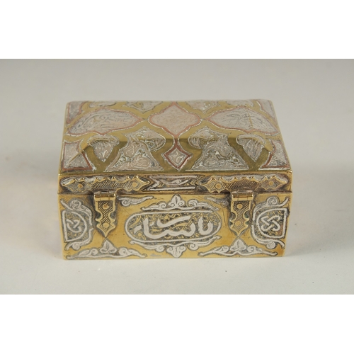 106 - A FINE 19TH CENTURY DAMASCUS SILVER AND COPPER INLAID BRASS BOX, 10cm across.