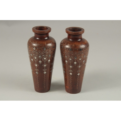 107 - A FINE PAIR OF LATE 19TH CENTURY OTTOMAN TURKISH SILVER INLAID WOODEN VASES, signed and dated to the... 