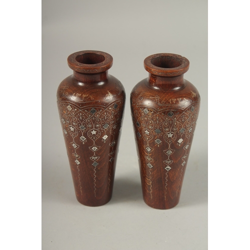 107 - A FINE PAIR OF LATE 19TH CENTURY OTTOMAN TURKISH SILVER INLAID WOODEN VASES, signed and dated to the... 