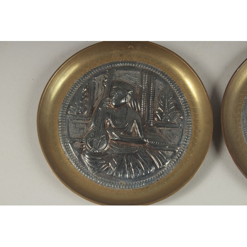 108 - A PAIR OF 19TH CENTURY INDIAN TANJORE SILVER MOUNTED BRASS DISHES, 8.5cm diameter each.