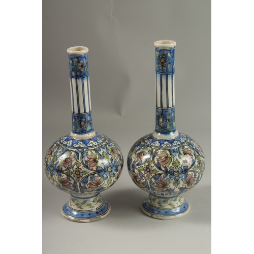 112 - A FINE PAIR OF 19TH CENTURY PERSIAN QAJAR GLAZED POTTERY BOTTLE VASES, 32cm high.