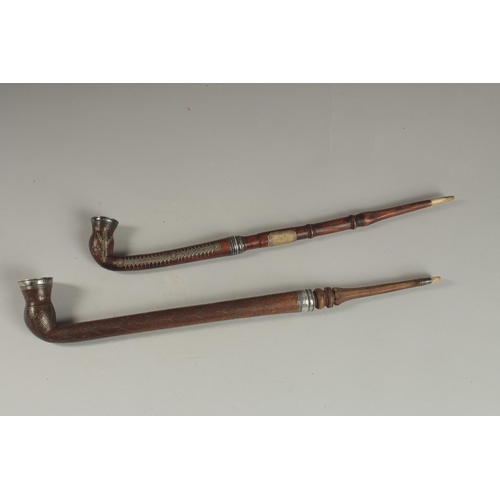 113 - TWO FINE OTTOMAN TURKISH SILVER AND BRASS INLAID WOODEN SMOKING PIPES, longest 43cm long, (2).