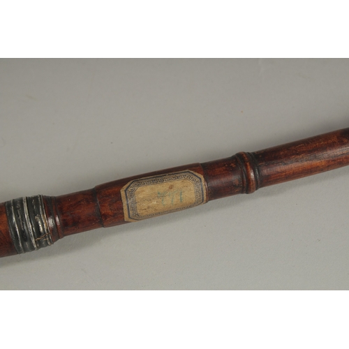 113 - TWO FINE OTTOMAN TURKISH SILVER AND BRASS INLAID WOODEN SMOKING PIPES, longest 43cm long, (2).