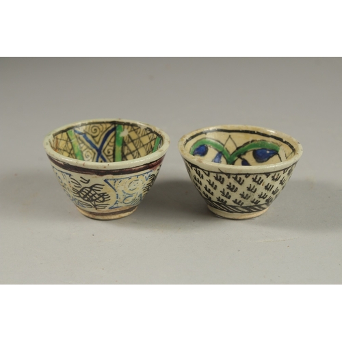 115 - TWO 18TH CENTURY OTTOMAN TURKISH KUTAHYA COFFEE CUPS.