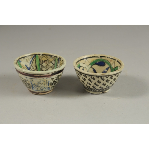 115 - TWO 18TH CENTURY OTTOMAN TURKISH KUTAHYA COFFEE CUPS.