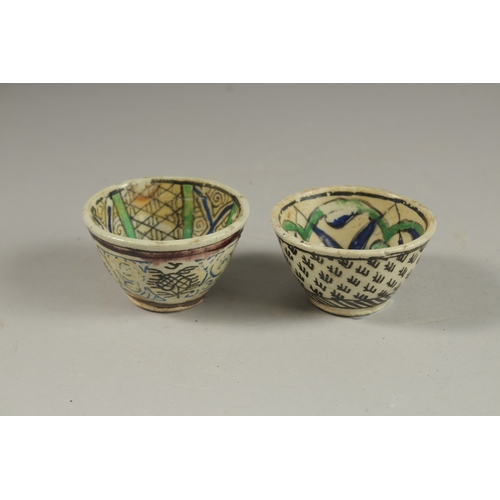 115 - TWO 18TH CENTURY OTTOMAN TURKISH KUTAHYA COFFEE CUPS.