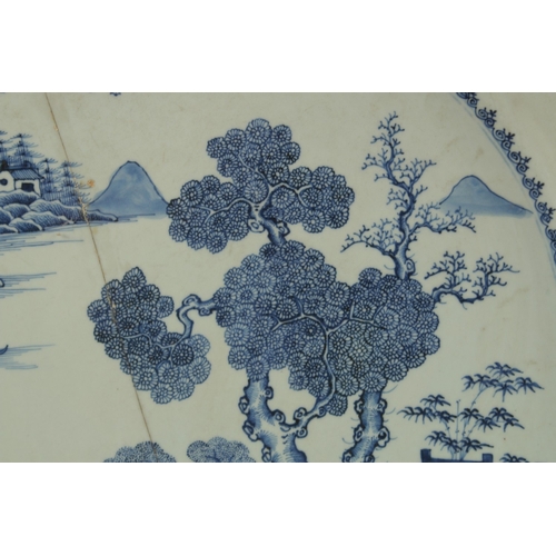 12 - A VERY LARGE CHINESE BLUE AND WHITE PORCELAIN CHARGER, (af), 55cm diameter.