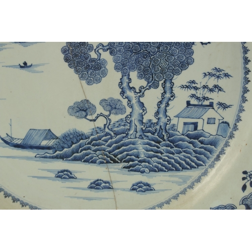 12 - A VERY LARGE CHINESE BLUE AND WHITE PORCELAIN CHARGER, (af), 55cm diameter.