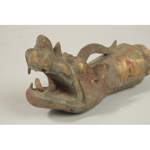 122 - A RARE CHINESE OR TIBETAN POSSIBLY MING DYNASTY GILT COPPER DRAGON HEAD FINIAL, probably a furniture... 