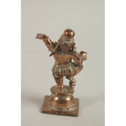 123 - A 19TH CENTURY SOUTH INDIAN TANJORE CAST COPPER BABY KRISHNA, 11.5cm high.