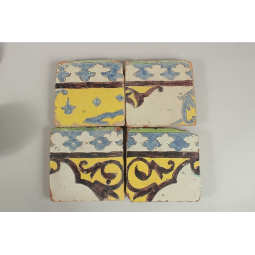 128 - A COLLECTION OF FOUR 18TH CENTURY PERSIAN CUERA SECA POTTERY TILES, (4).