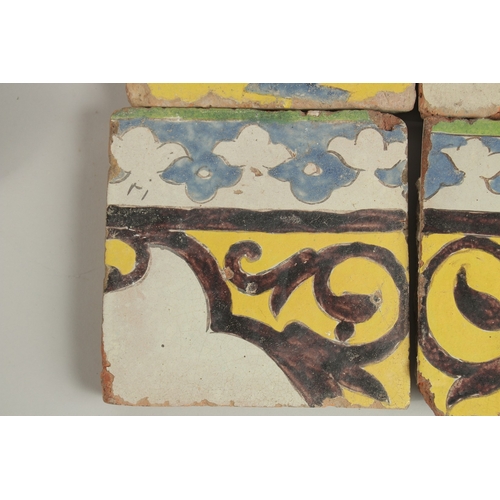 128 - A COLLECTION OF FOUR 18TH CENTURY PERSIAN CUERA SECA POTTERY TILES, (4).