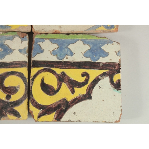 128 - A COLLECTION OF FOUR 18TH CENTURY PERSIAN CUERA SECA POTTERY TILES, (4).