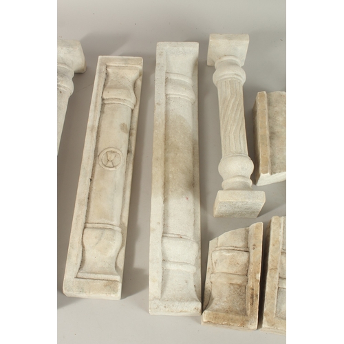 129 - A COLLECTION OF SEVEN ISLAMIC MAMLUK STYLE CARVED MARBLE PILLARS, some with Mamluk cup symbols, (7).