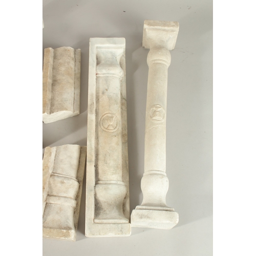 129 - A COLLECTION OF SEVEN ISLAMIC MAMLUK STYLE CARVED MARBLE PILLARS, some with Mamluk cup symbols, (7).