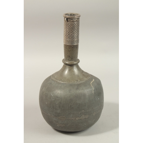 134 - A RARE 18TH CENTURY MUGHAL INDIAN SILVER MOUNTED LEAD SURAHI BOTTLE, 30cm high.