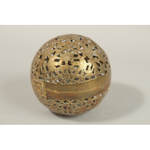 135 - A FINE EARLY 19TH CENTURY MUGHAL NORTH INDIAN OPENWORKED BRASS HAND WARMER, with birds and flower de... 