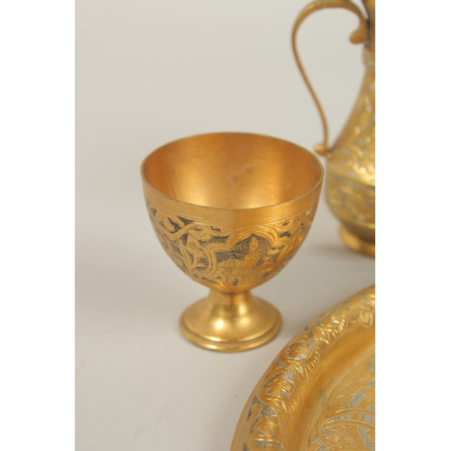 136 - A FINE 19TH-20TH CENTURY OTTOMAN TURKISH GILT COPPER TOMBAK COFFEE SET, tray 21cm diameter.